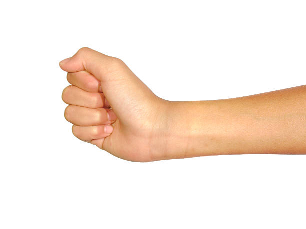 istock Female's fist isolated on white background 485829870