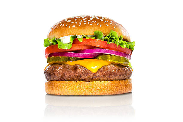 hamburger Perfect hamburger classic burger american cheeseburger isolated hamburger with sesame seed bun and extra toppings of tomatoes pickles onion and cheddar cheese cheddar cheese photos stock pictures, royalty-free photos & images