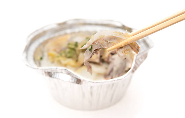 istock chopsticks catching a piece of chicken 485837194