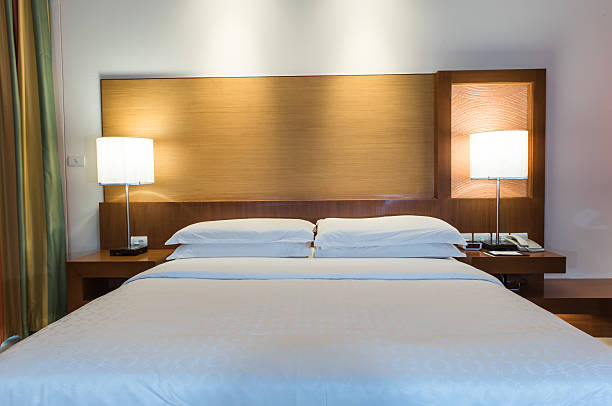 istock bed in a business hotel room 485839688