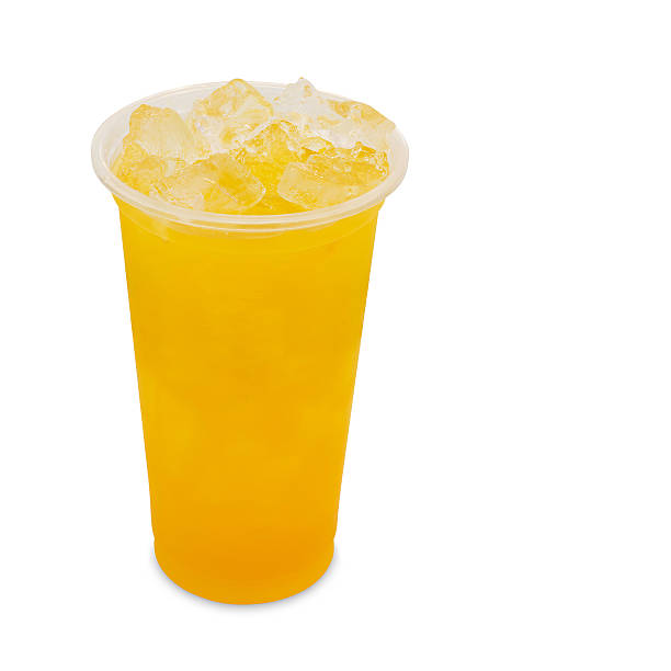 istock ice tea mango in takeaway glass isolated on white 485841606