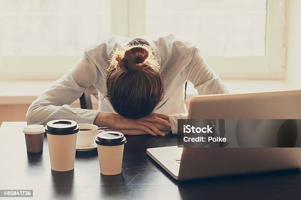 Tired Woman In The Office Stock Photo - Download Image Now - Tired, Women, One Woman Only