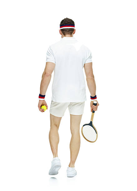istock Rear view of tennis player walking 485849573