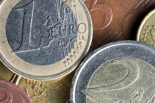 istock Euro Coins on Top of Each Other 485850064