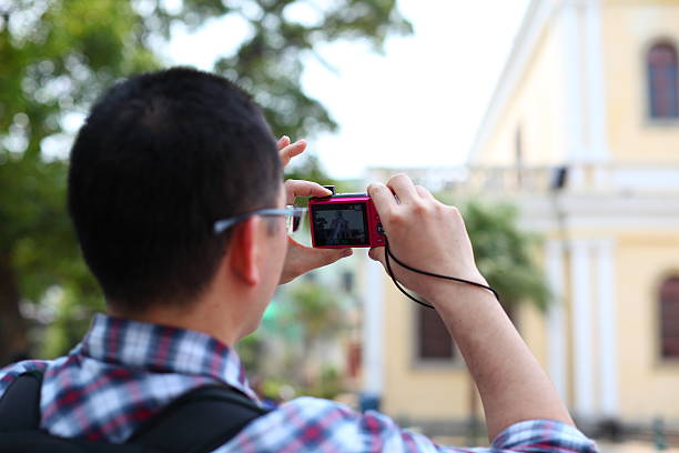 istock Single Chinese man taking pictures 485850193