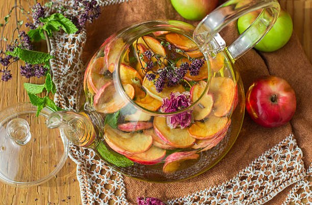 istock Herbal tea with apple, mint, oregano and thyme 485850254