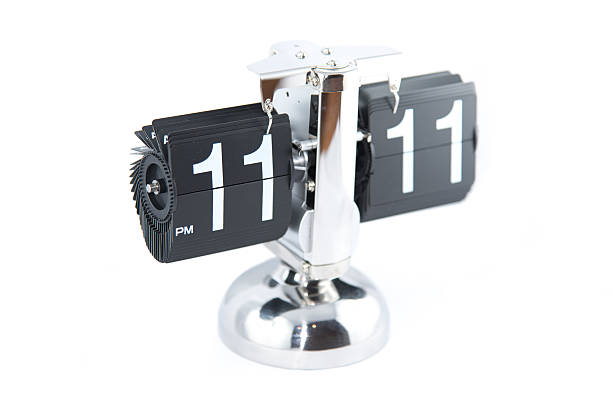 Vintage flip clock Isolated vintage flip clock on white background white flip clock stock pictures, royalty-free photos & images