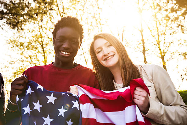 istock Teenagers with USA flag 485850383