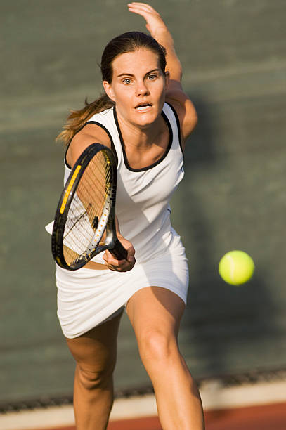 istock Tennis Player Reaching For Ball 485850955