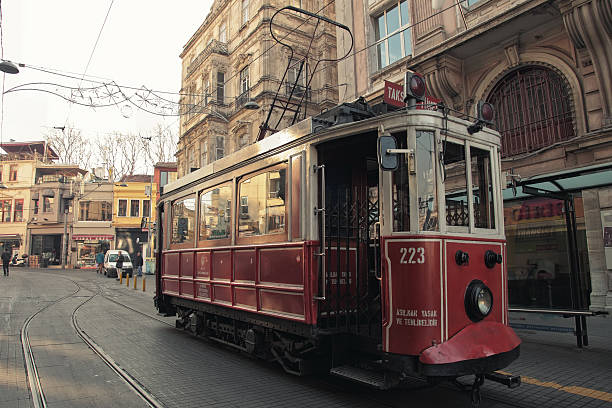 Old empty red Tatra T5 tram in cloudy day. View from the side. Kyiv, Ukraine - May. 2021