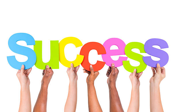 istock Multi-Ethnic Group Of People Holding The Word Success 485851857