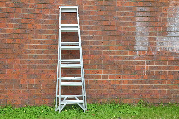 istock Aluminum ladder against the wall. 485852428
