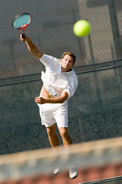 istock Tennis Player Hitting A Shot On Court 485852589