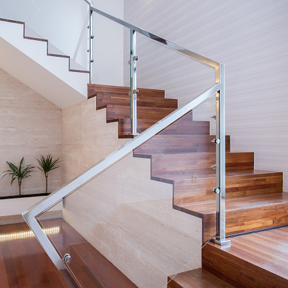 Image of stylish staircase in bright house interior