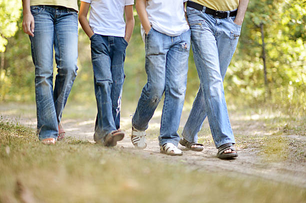 istock Legs of walking people 485852962