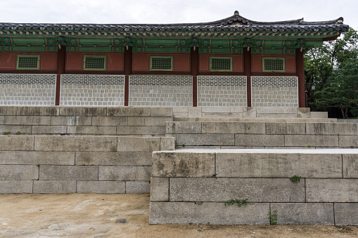 Architecture and scenery around gyeonghuigung palace with the entrance and the pathway to the main courtyard.