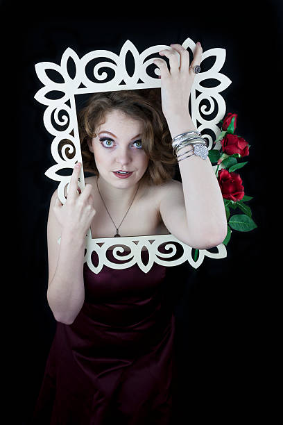 istock Beautiful woman coming out of frame 485856933