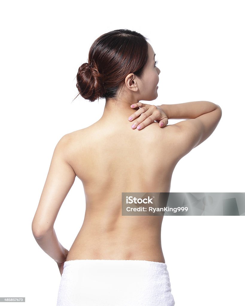 Woman massaging Woman massaging pain back and shoulder isolated on white background, asian Adult Stock Photo