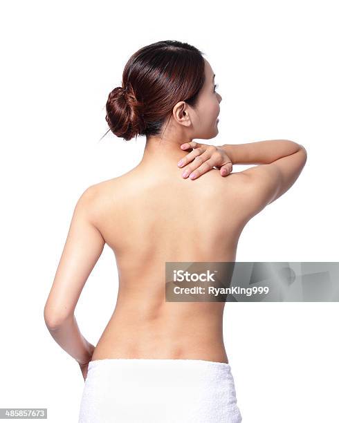 Woman Massaging Stock Photo - Download Image Now - Adult, Backache, Body Care