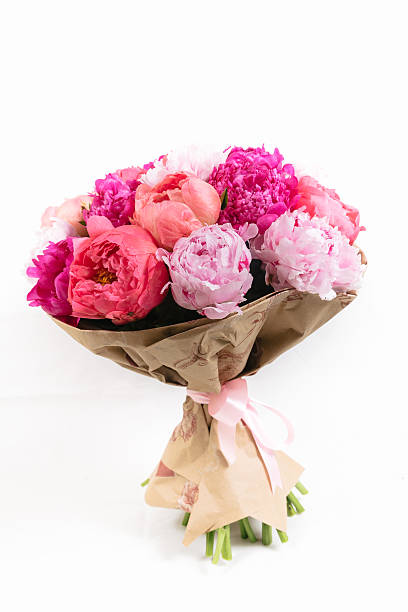 istock Rich bunch of peonies and tea roses on white background 485861352