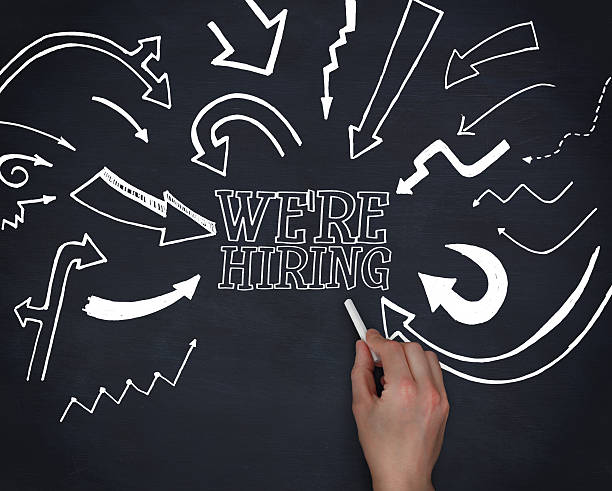 istock Hand writing we are hiring with a chalk 485862807