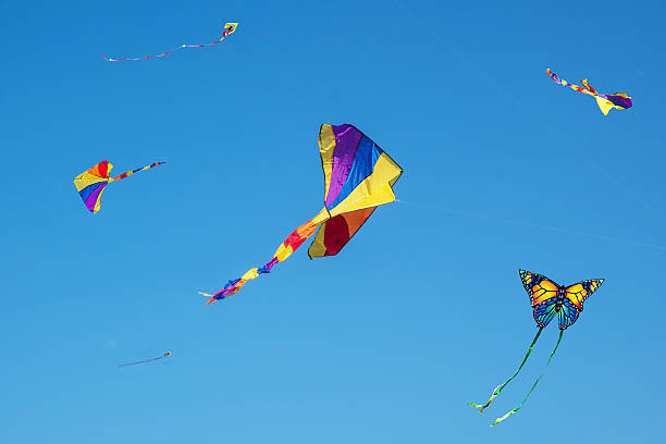 istock Colorful, bright kites in the sky 485862860