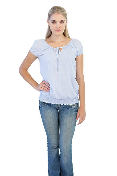 istock Serious blonde woman with hand on her hip 485863605