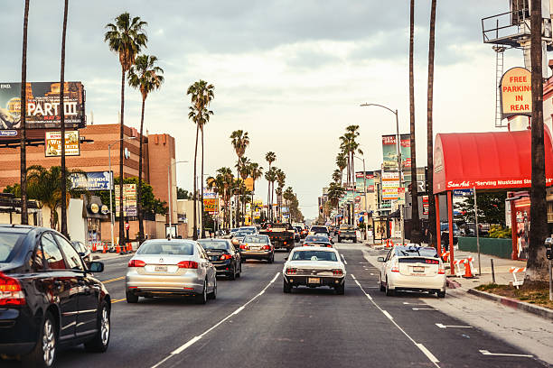 Traffic on Sunset Boulevard, Hollywood, Los Angeles Hollywood, Los Angeles, USA - May 8, 2013: Evening traffic on Sunset Boulevard, Hollywood, Los Angeles. sunset strip stock pictures, royalty-free photos & images