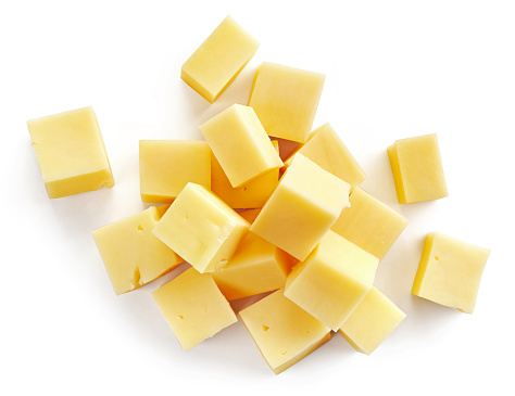 cheese cubes isolated on white background, top view