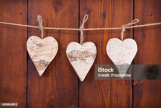 Three Hanging Wooden Hearts Stock Photo - Download Image Now - Art, Art And Craft, Beauty