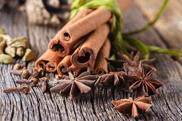 istock Mulled wine recipe, spices on wooden background 485866456