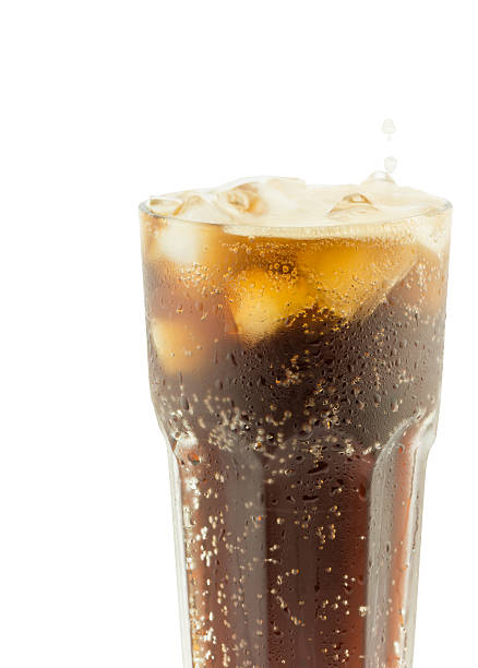 istock Cola glass with ice cubes on a white background 485867346
