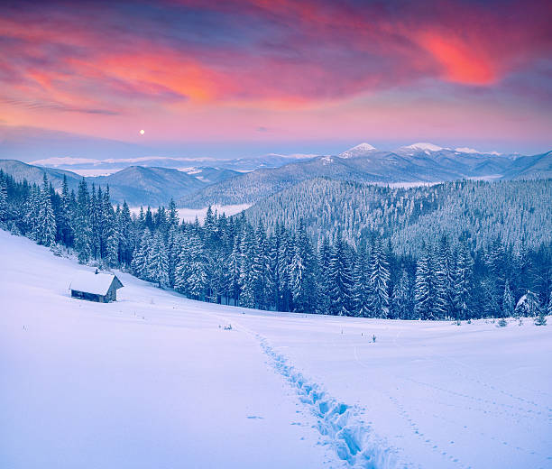 istock Rising moon above Gorgany ridge in winter Carpathian mountains. 485867822