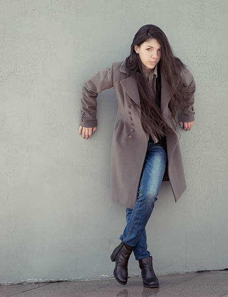 istock Brunette girl in coat. 485868119