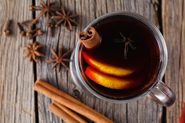 istock Mulled wine and spices on weathered wooden table 485868142