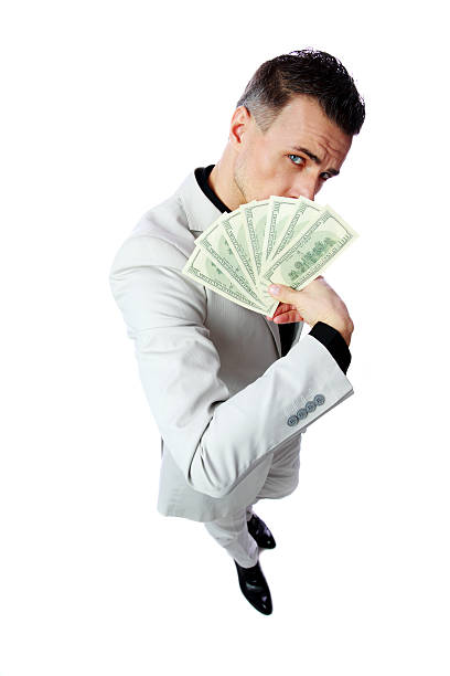 istock businessman holding US dollars 485868195