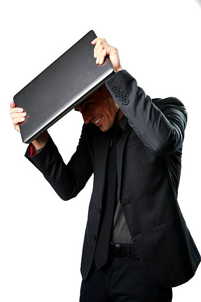 istock Business man hides under the laptop 485868207