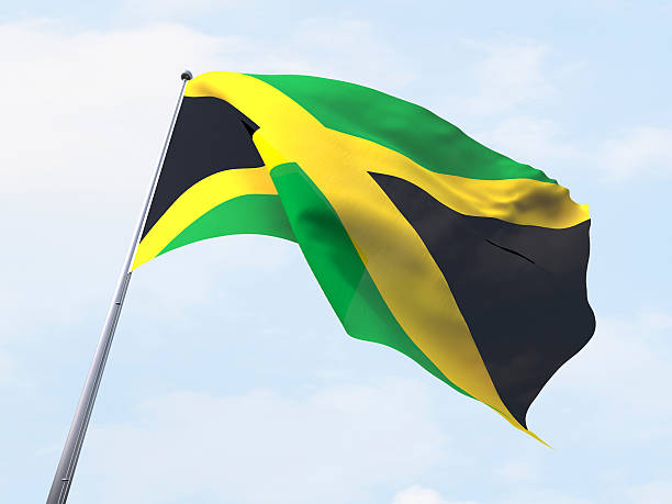 istock Jamaica flag flying on clear sky. 485868274