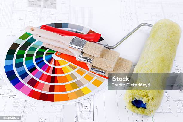 Color Swatch For Home Improvement Blueprints And Paintbrush Stock Photo - Download Image Now