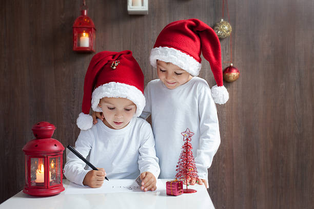 istock Two adorable boys, writing letter to Santa 485868884