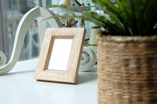 istock Photo frame on wooden table. 485869382