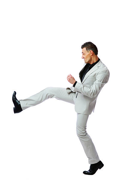 istock angry businessman imitating a fight standing 485870179
