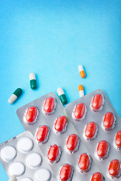 istock Packs of different pills - abstract medical background 485870781