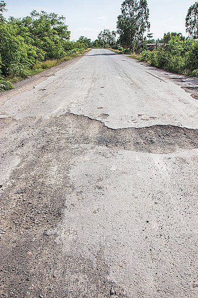 istock Damaged road in the countryside 485872652