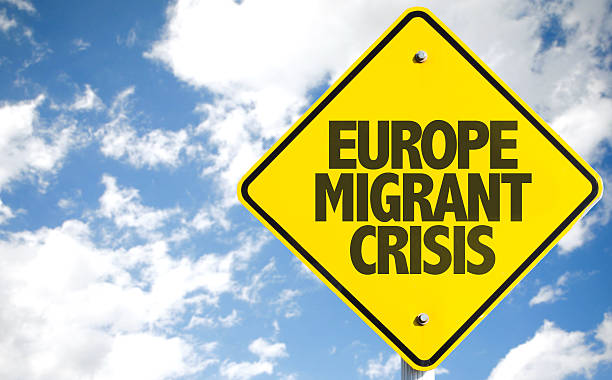 istock Europe Migrant Crisis sign with sky background 485872720