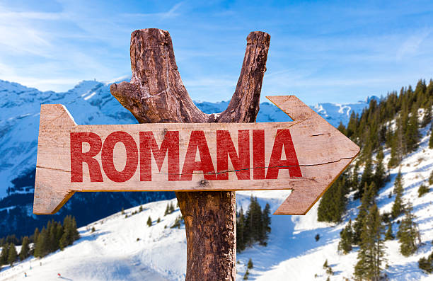 istock Romania wooden sign with winter background 485873684
