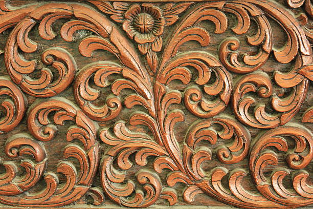 istock Carved wooden flowers ,background 485874676