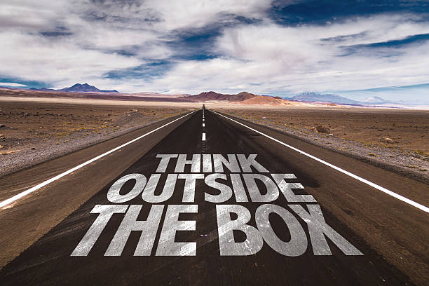 istock Think Outside the Box written on desert road 485876596