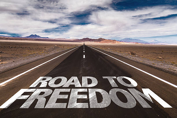 istock Road to Freedom written on desert road 485877054