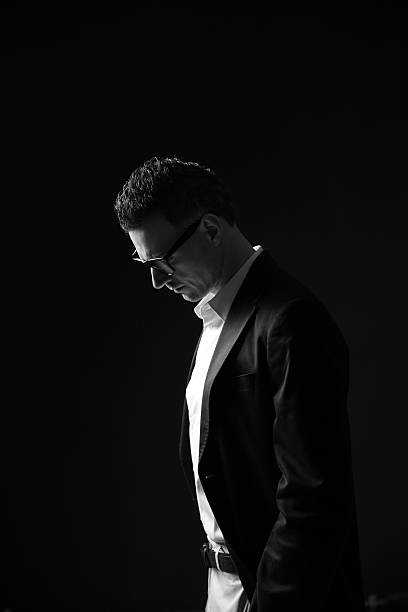 istock pensive businessman in glasses 485878077